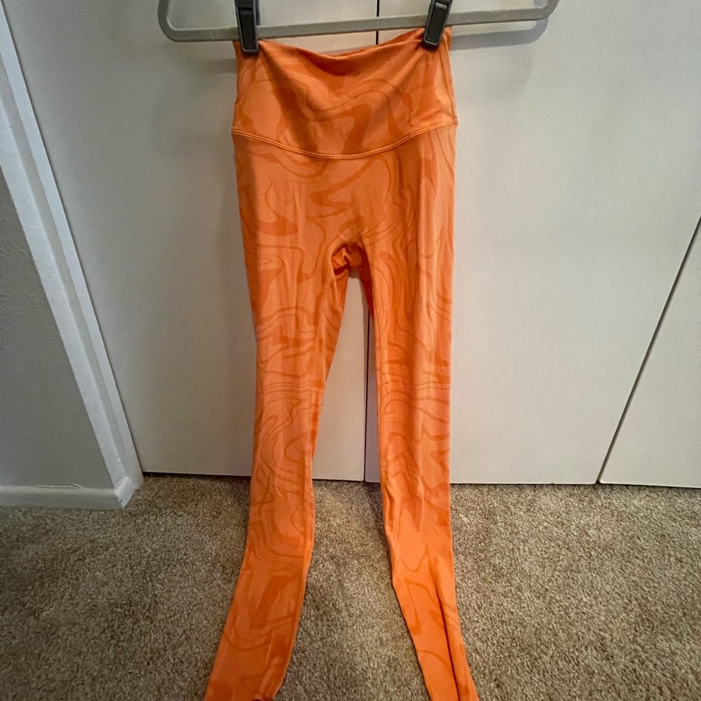 Orange with swirls workout tights